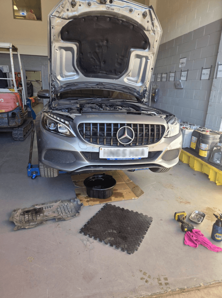 Mechanic working on a car