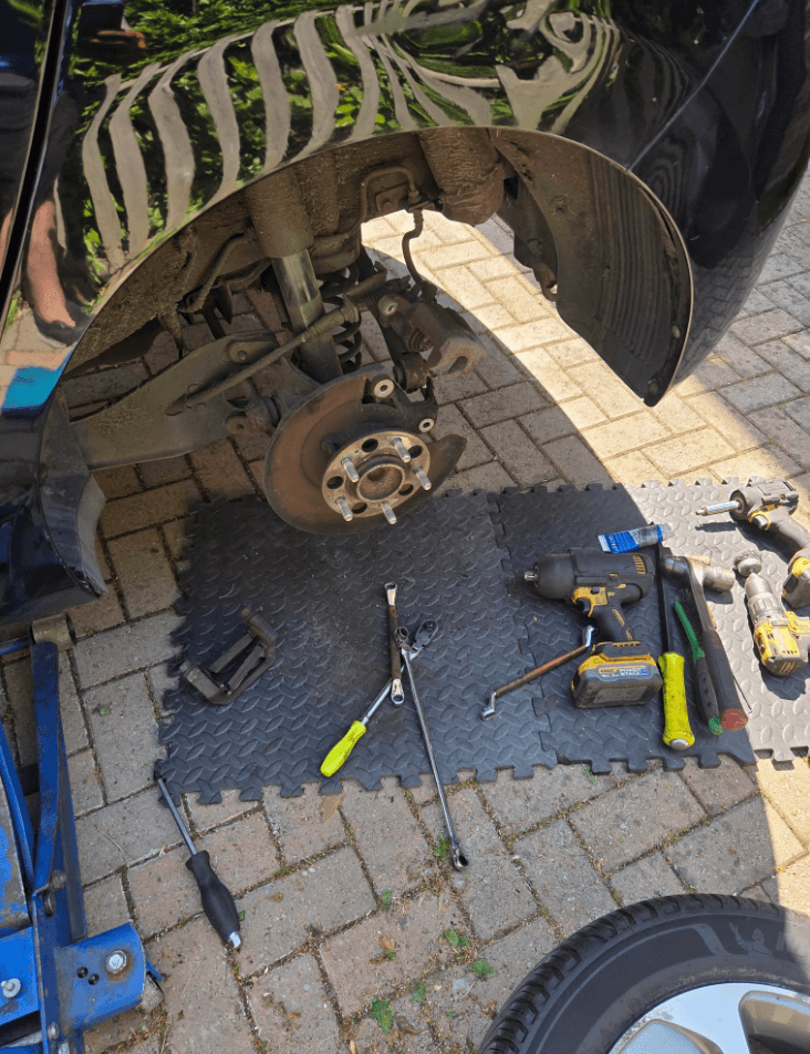 Mechanic working on a car
